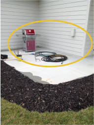 An example photo of a patio that requires mudjacking.