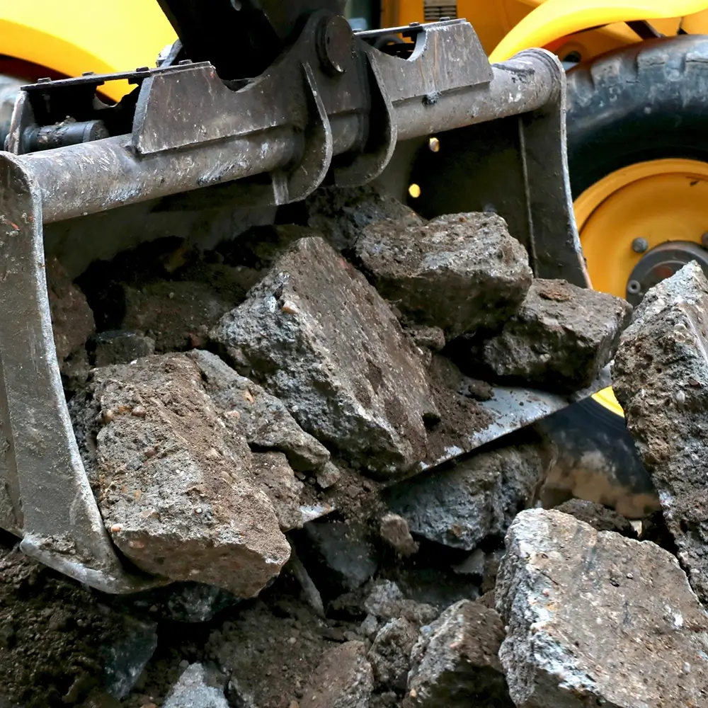 mixan-mudjacking-concrete-removal-loader - Mixan Mudjacking