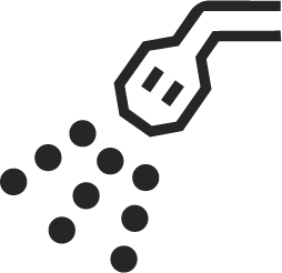A simple black and white icon of a hand sprinkling small round seeds or particles onto a surface.
